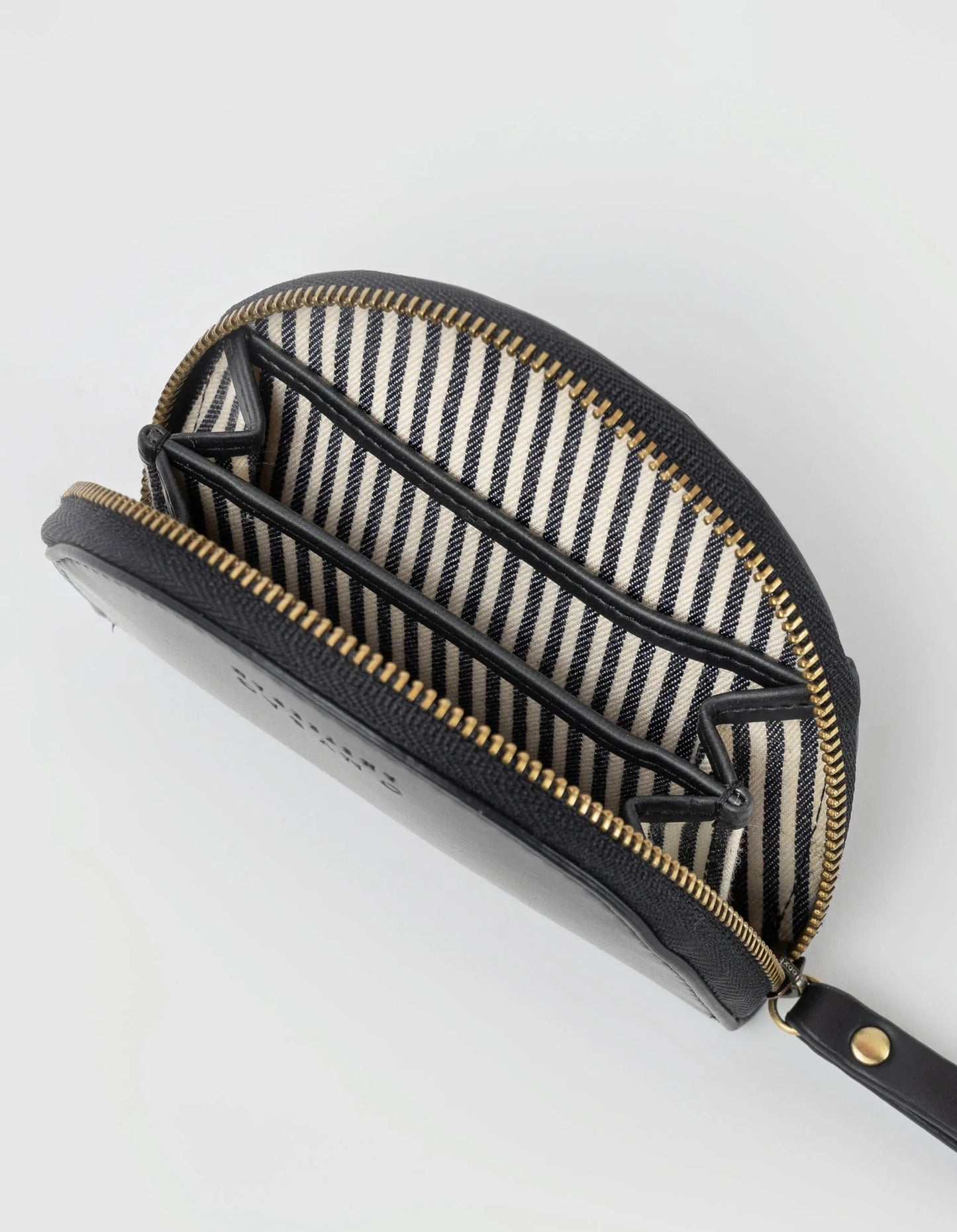 View of monochrome stripe interior of vegan black leather coin and card purse with zip. By O My Bag. Now available at The FAIR Shop in Brighton, UK.